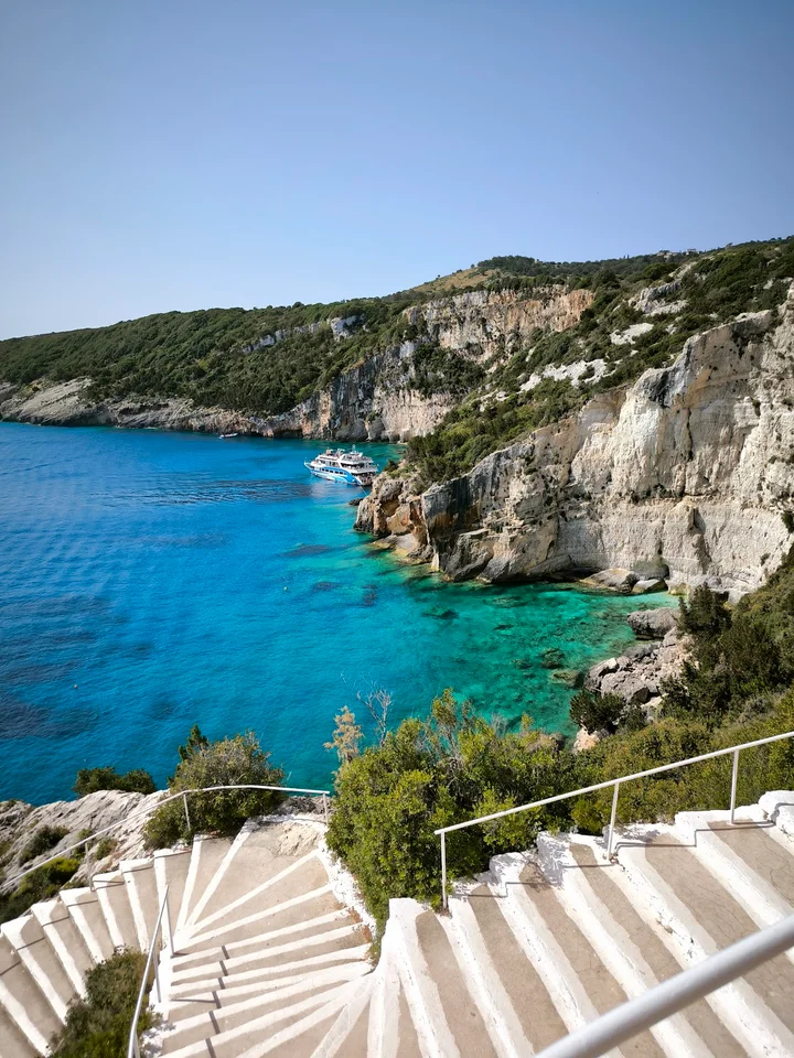 Cliff stairs descending toward the sea
